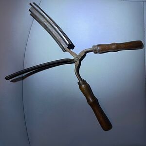 Vintage crimping iron hair salon display item